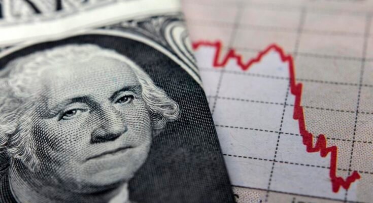 Graphique boursier à côté d'une facture de 1 dollars