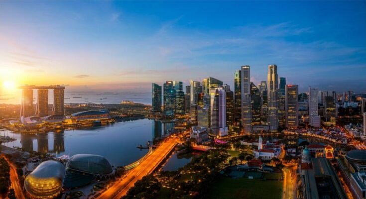 Singapour City et Sunrise Sky in Harbour Side View
